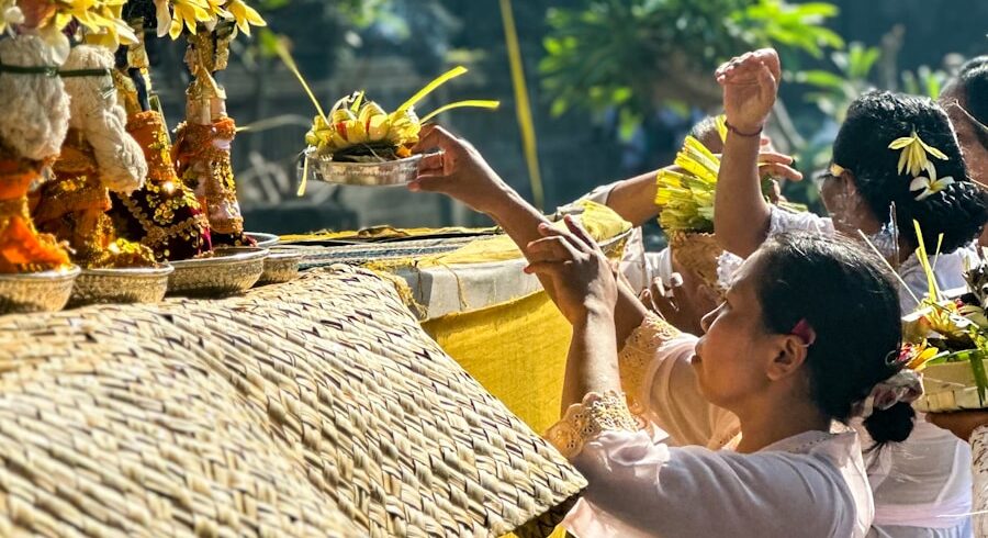 People offer prayers during a traditional ceremony.